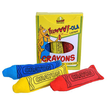 Yellow crayon-style box with cartoon cat pictured on the box with text that says 'Yeowww!-ola catnip' and 'crayons'. Three plush toy crayons lie in front, one blue, one red and one yellow. Pictured on a white background.