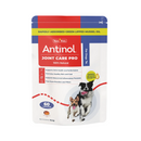 White background with a packet of Antinol Joint Care Pro for Dogs, the packet has red and blue ascents with a Border Collie dog and a Jack Russel terrier pictured. Additional text on the packet states '100% Natural, Supports Joint Health and Mobility, For healthy skin and a shiny coat, Supports natural anti-inflammatory processes, Free from powders and fillers'.