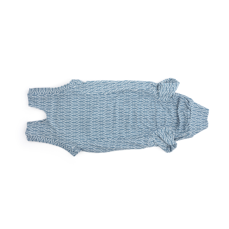 White background with one geometric blue bodysuits for cats pictured. 