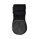 White background with the base of a black dog boot pictured. 