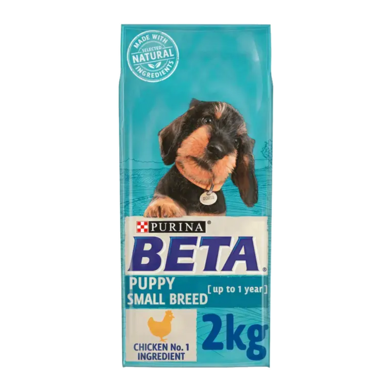 White background with a blue bag of Purina Beta Small Breed Puppy Food. Pictured on the bag is a dachshund puppy text on the bag reads 'Purina Beta, Puppy Small Breed (up to 1 year) Chicken No.1 Ingredient.' 