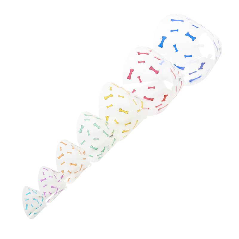 White background with a row of seven plastic Elizabethan style recovery collars with collared bones in different colours. 