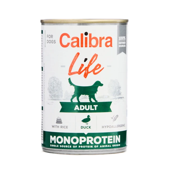 A can of Calibra Life Adult Monoprotein dog food on a plain white background. The can features a white label with green and orange text, a green silhouette of a dog, and icons indicating it is with rice, duck, and hypoallergenic.
