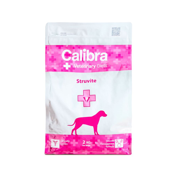 A bag of Calibra Veterinary Diets Struvite dog supplement, featuring a white and bright pink design with a dog silhouette.