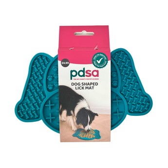 PDSA dog shaped lick mat shown in its retail packaging, with two teal silicone lick mats visible behind the pink and white box on a white background.