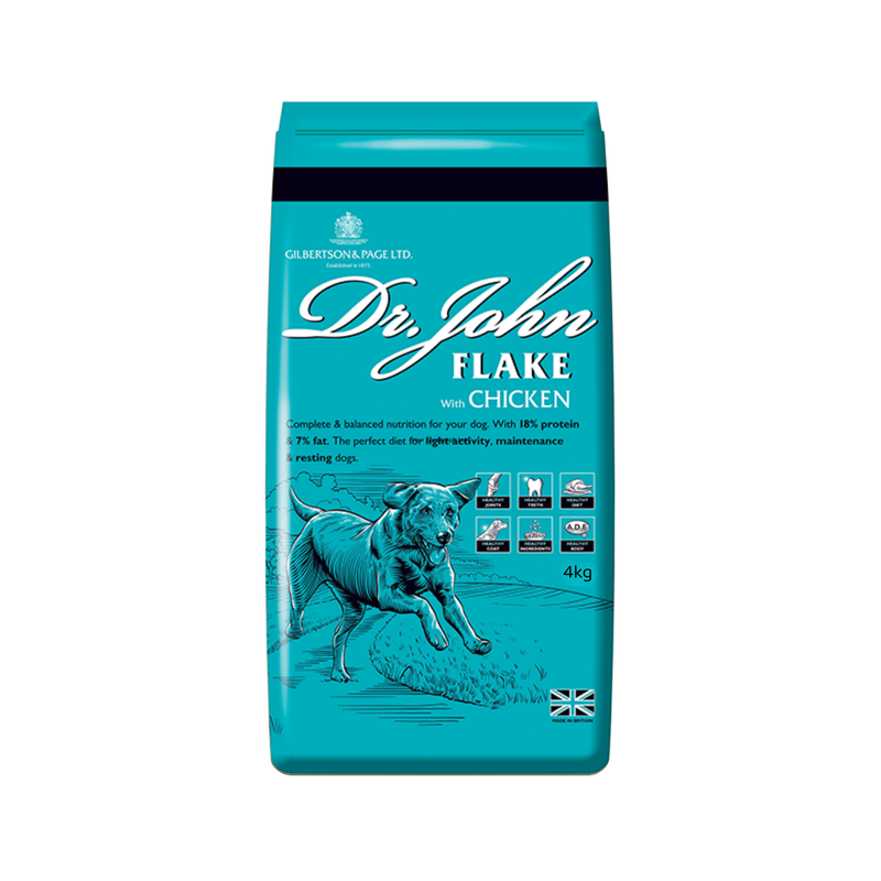 White background with an blue bag of Dr.John Flake with Chicken dry food. Pictured on the bag is an illustrated Labrador dog in a farm field. 