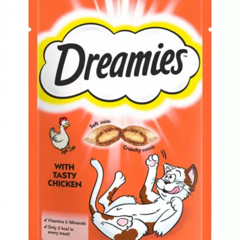 White background with a close of an orange packet of Dreamies with Tasty Chicken pictured. On the packet is an illustrated cartoon cat on it's back with an image of the treats above it and an illustrated chicken. Text on the pack reads 'Dreamies, soft inside, crunchy outside, with tasty chicken.' 