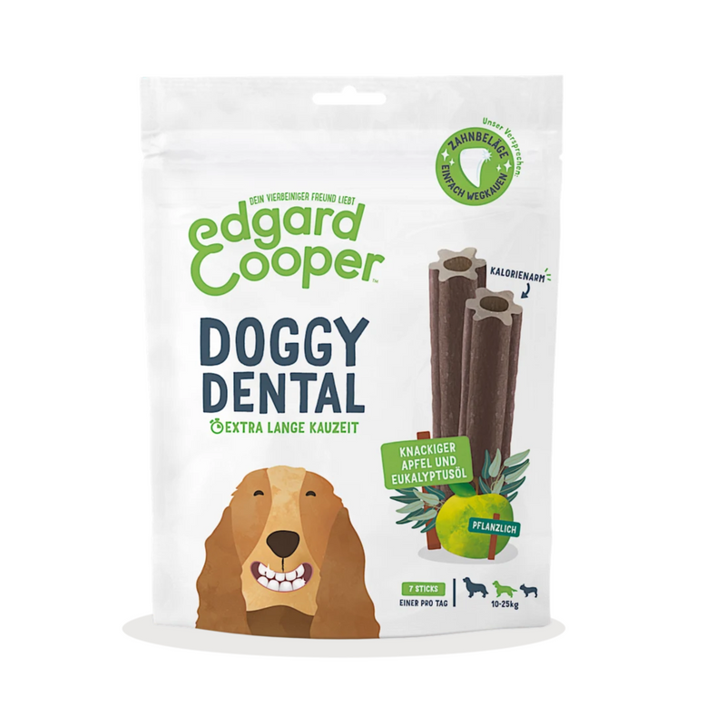 White background with a packet of Edgard & Cooper Doggy Dental Sticks pictured. On the packet is an illustrated Spaniel with a teethy grin. Text on the pack reads, 'Edgard & Cooper, Doggy Dental, Extra Long Chew Time' with a picture of a stick treat to the right, text next to it reads 'Crisp Apple & Eucalyptus Oil. Plant based.'  
