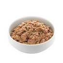 White background with a white bowl of Edgard and Cooper wet dog food pictured. 