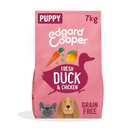 White background with an pink bag of Edgard & Cooper Puppy Dry Food Duck and Chicken pictured. On the packet is an illustrated French Bulldog and Cocker Spaniel puppy. Text on the pack reads, 'Edgard & Cooper.' A silhouette of a duck has text inside 'Fresh Duck and Chicken'.
