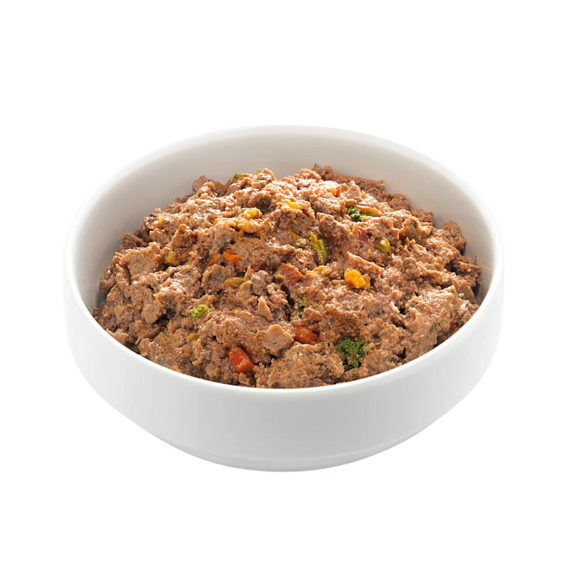 White background with a white bowl of Edgard and Cooper wet dog food pictured. 