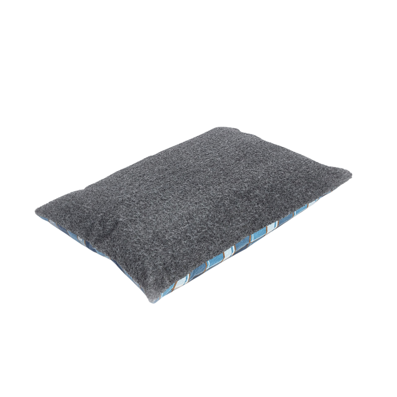 Pillow-type blue checked dog bed with a grey underside pictured upside down on a white background. 