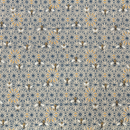Close up of blue and yellow geometric fabric with bee details. 