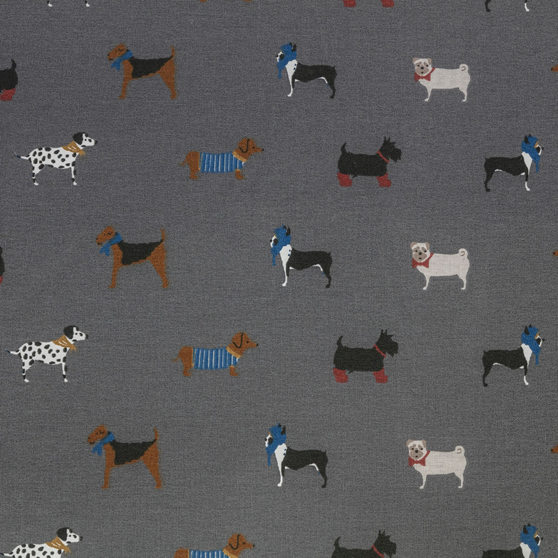 Close up of grey dog fabric with illustrated dogs - Pug, Dachshund, Boston terrier, fox terrier and Dalmatians.  