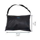 Henry Wag Easy-roll travel bed in it's black carry bag, with measurements on either side indicting width 35cm, height 28cm. Pictured on a white background. 
