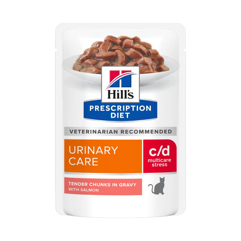 Hills Prescription cat food pouch with a bowl full of food pictured on the packet, text reads 'Urinary Care, C/D Multicare Stress' and 'Tender chunks in Gravy with Salmon' on a white background. 