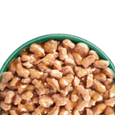 White background with close up of green bowl pictured filled with wet adult cat food.