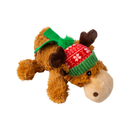 A size view of a Brown fluffy reindeer dog toy with dark brown fabric antlers wearing a red festive patterned hat and a green scarf, pictured on a white background. 