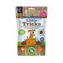 White background with a packet of Little BigPaw 'Little Tricks' dog treats. Pictured on the packet is an illustration of a brown dog with a cooked chicken and vegetables in the foreground. Text on the bag says 'Irresistibly tasty training treats for all dogs & puppies, 100% natural ingredients, soft & squidgy baked treats. Approx. 100 treats!' 