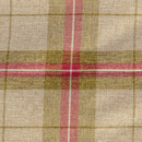 Close up of plaid green, red and cream fabric dog bed. 