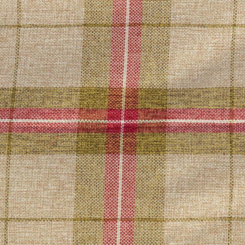 Close up of plaid green, red and cream fabric dog bed. 
