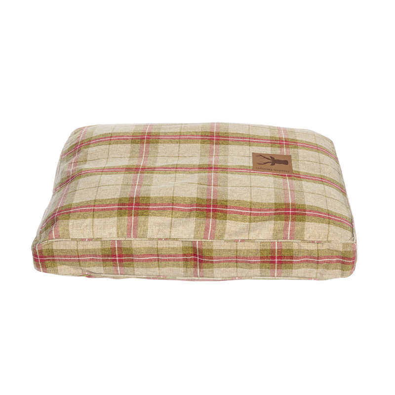 Front view of pillow-type red and green checked dog bed pictured on a white background. 