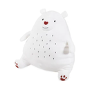 Side view of white polar bear dog toy with a red nose and paws with stitch details for eyes, mouth and belly markings, pictured on a white background. 
