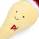 White background with a close up view of a plush toy parsnip with a red Santa hat and stitched eyes and smile. 