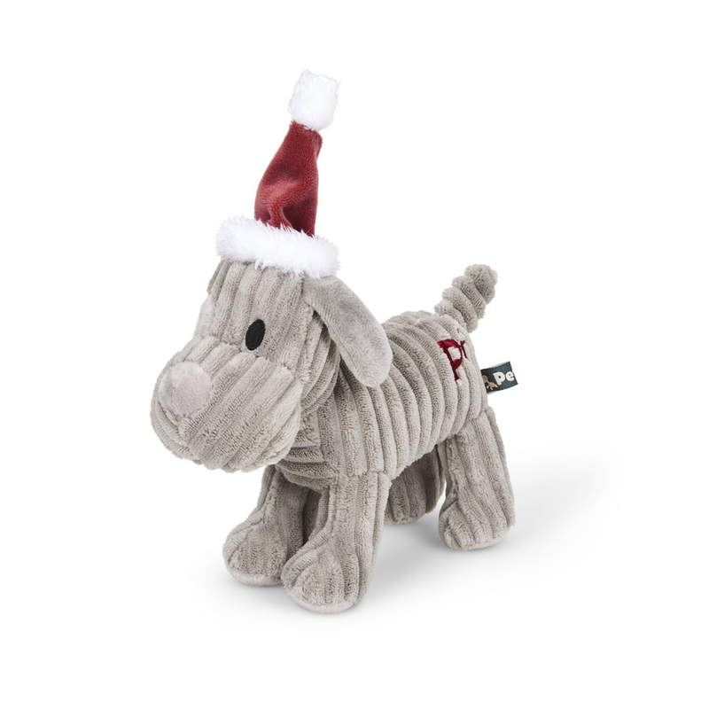 Side view of grey dog dog toy made from soft cord effect fleece material with red 'PF' stitched on hip, wearing a red Christmas hat, standing on a white background. 