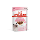 White background with a sachet of Royal Canin Kitten chunks in gravy. Pictured on the packet is a Ragdoll kitten, text on the tin states 'Up to 12 months'. 