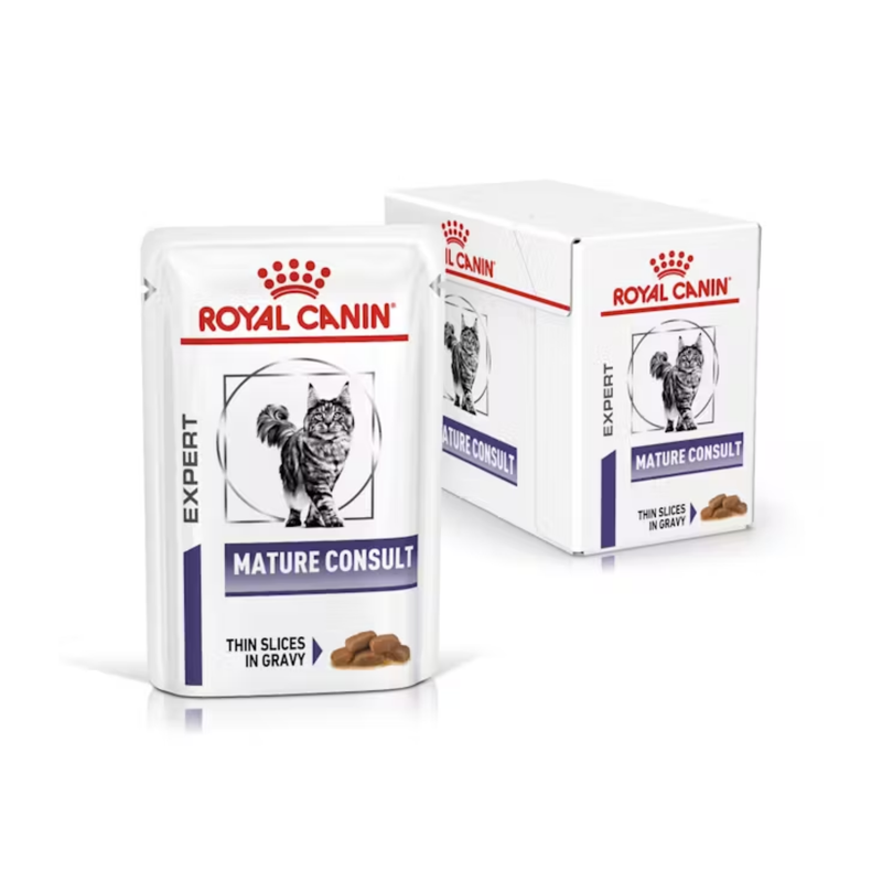 White background with a box of wet cat food pouches with an long haired tabby cat pictured on the box, text on the box says 'Royal Canin Expert, Mature Consult, Thin slices in gravy' In the foreground is a pouch with the same text and style as the box. 