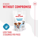White background with a packet of Royal Canin Training Treats for dogs pictured. Above the picture is the title 'Reward without Compromise' and text below reads 'Less than 3 calories per piece'. 