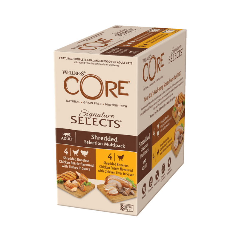 White background with a picture of a side view of a box of Wellness CORE Signature Selects wet cat food. The box is cream with text stating 'Wellness CORE, Natural, Grain Free, Protein-Rich, Signature Selects, Shredded Selection Multipack, Adult, 4x Shredded Boneless Chicken Entrée flavoured with Turkey in Sauce, 4x Shredded Boneless Chicken Entrée flavoured with Chicken Liver in Sauce' with a pictures of two chopping boards with fresh cooked chicken and turkey on. 