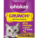 White background with a close up of a purple packet of Whiskas Crunch!, on the packet is silver tabby cat's face with a bowl of food pictured. Text on the pack reads 'Whiskas Crunch! Delicious Topping, with Chicken, Turkey & Duck.' 