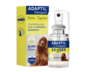 A yellow box of ADAPTIL Transport 'Better Together' dog calming spray with a spray bottle of the product next to it. Pictured on the box is an Irish setter dog.