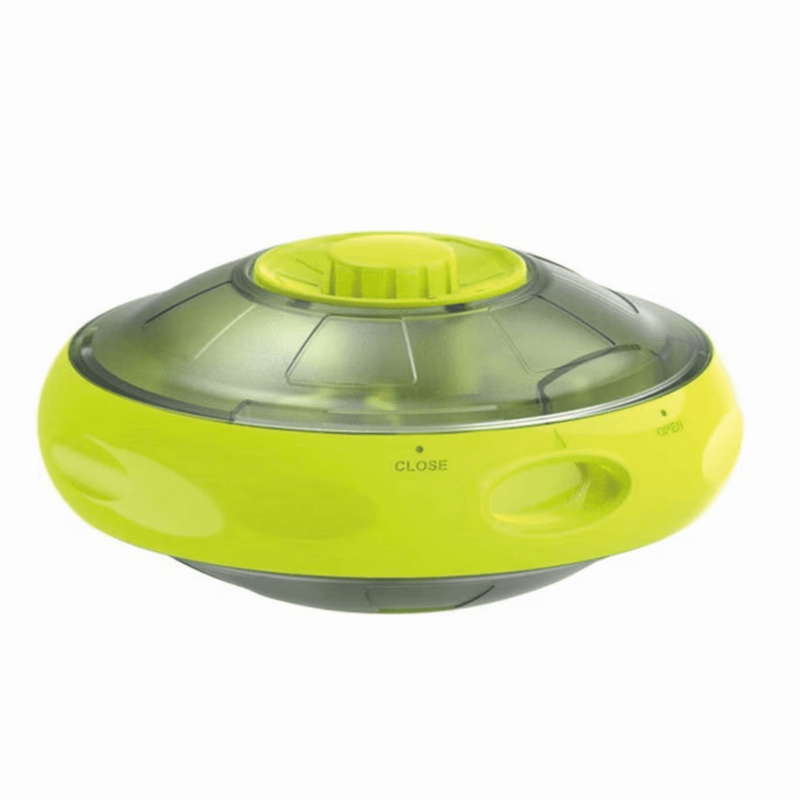 UFO shaped treat dispenser with green central and top parts with main body in grey sat on a white background. 