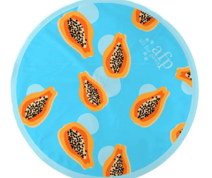 Blue circular cooling mat with orange papaya fruit pattern on a white background. 