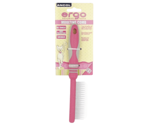 White background with a pink and grey Ergo Cat Moulting Comb with metal teeth, attached to a cardboard backing. 
