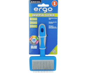 White background with a small blue and grey Ergo Slicker Brush with metal teeth , attached to a cardboard backing. 