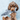 Cocker Spaniel dog holding a grey and white Ancol Made From Shark dog toy in it's mouth. 