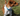 Jack Russell terrier wearing a blue Ancol Buckle dog collar, pictured outside on grass. 