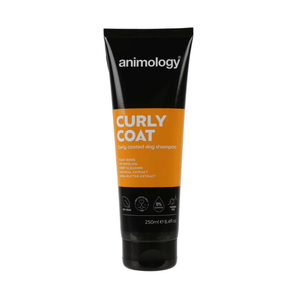 White background with a black and orange bottle of Animology Curly Coat Shampoo. On the bottle is white text 'Animology Curly Coat, Curly coated dog shampoo'. 