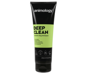 White background with a black and lime green bottle of Animology Deep Clean Shampoo. On the bottle is white text 'Animology Deep Clean, intensive dog shampoo'. 