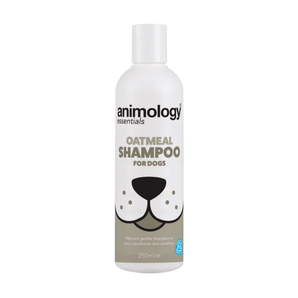 White background with a white and beige 250ml bottle of Animology Essentials Oatmeal Shampoo for Dogs. On the bottle is an illustrated muzzle with white text below 'Mild and gentle shampoo to clean, deodorise and condition.' 
