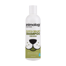 White background with a white and olive green 250ml bottle of Animology Essentials Olive and Walnut Shampoo for Dogs. On the bottle is an illustrated muzzle with white text below 'Mild and gentle shampoo to clean, deodorise and condition.' 