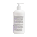 White background with a back view of a white and lilac 500ml bottle of Animology Essentials Sensitive Shampoo for Dogs.