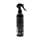 White background with a back view of a black and grey spray bottle of Animology Glossy Dog. 