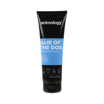 White background with a black and blue bottle of Animology Hair of the Dog Shampoo. On the bottle is white text 'Animology Hair of the Dog, Anti-tangle dog shampoo'. 