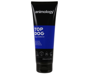 White background with a black and dark blue bottle of Animology Top Dog Conditioner. On the bottle is white text 'Animology Top Dog, Dog Conditioner'. 