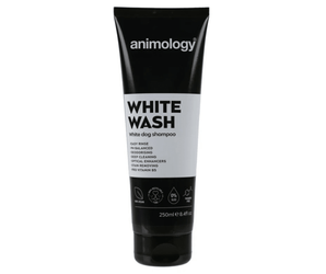 White background with a black and white bottle of Animology White Wash Dog Shampoo. On the bottle is white text 'Animology White Wash, White dog shampoo'. 